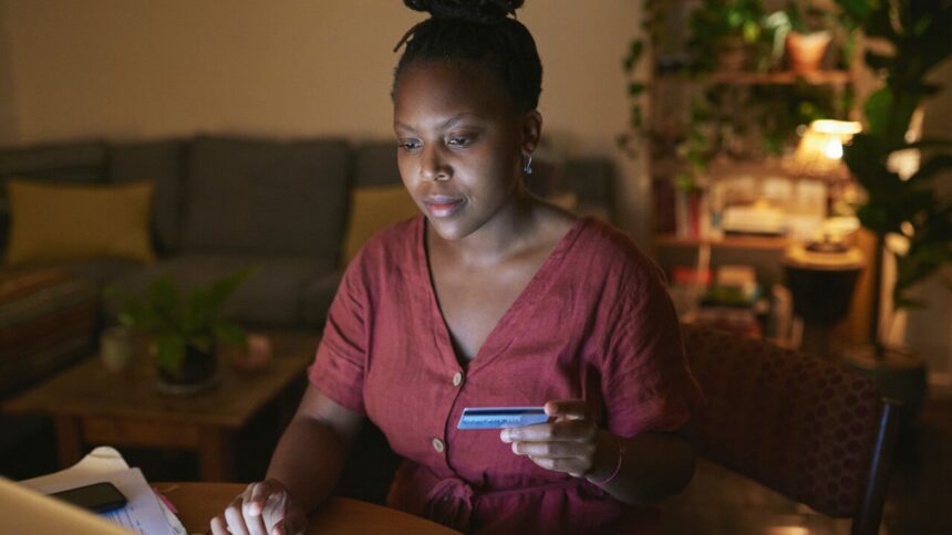 When will the issuer of a credit card report to the credit department?