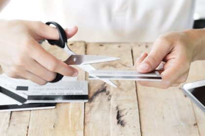If I have the power of a lawyer, can the bank cancel my dead parent's credit card?